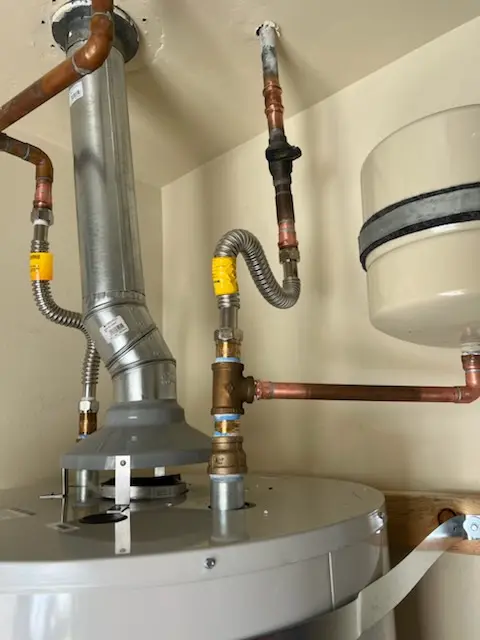 Water heater installation and plumbing repair in Warrington